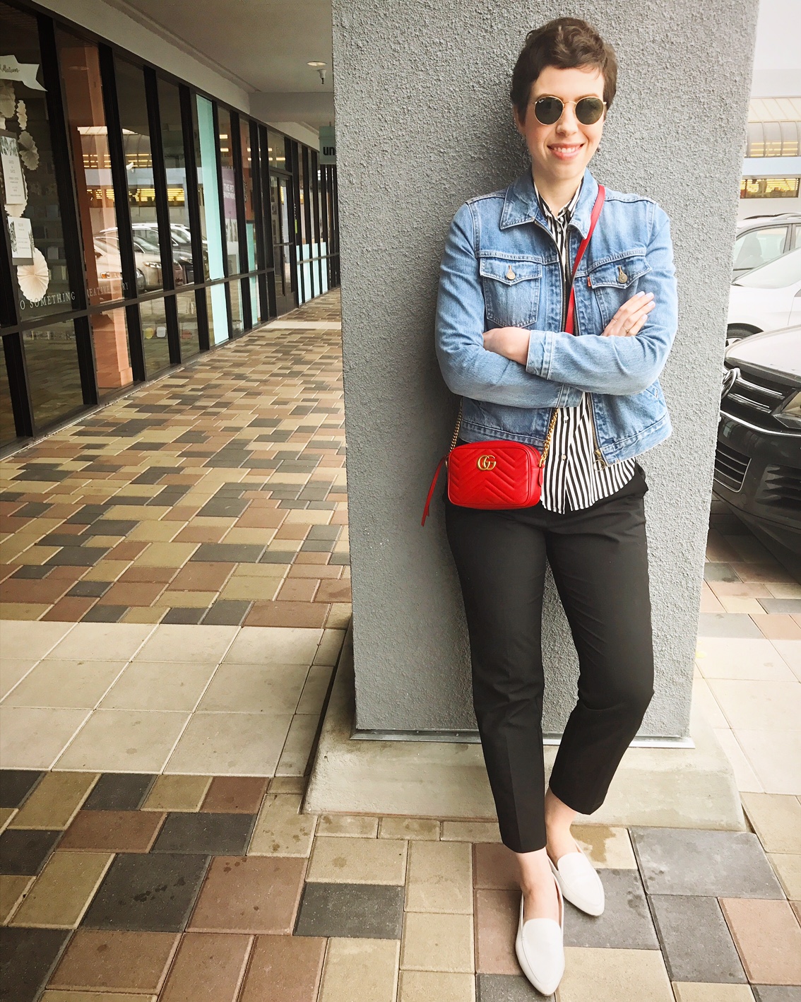 Striped shirt, jean jacket, red Gucci Marmont Matelasse bag